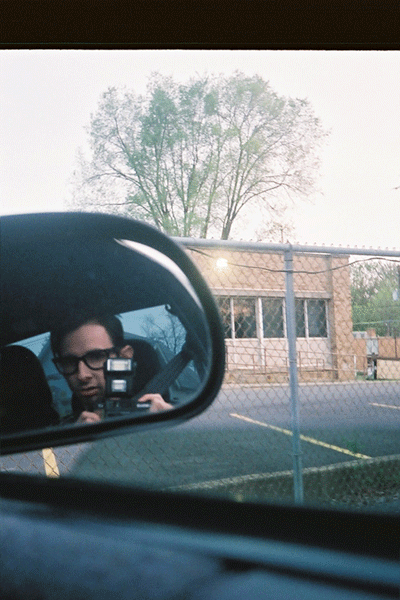 self-portrait in side mirror